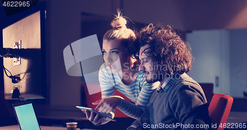 Image of young designers in the night office