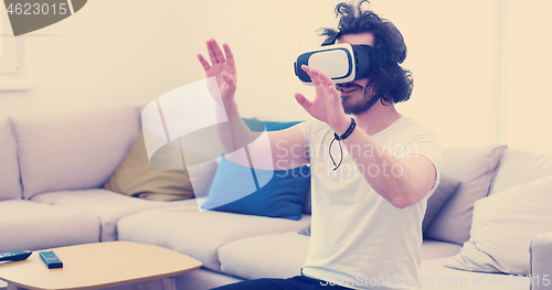 Image of man using VR-headset glasses of virtual reality