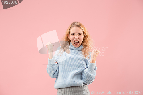 Image of Winning success woman happy ecstatic celebrating being a winner. Dynamic energetic image of female model