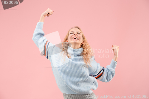 Image of Winning success woman happy ecstatic celebrating being a winner. Dynamic energetic image of female model