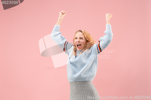 Image of Winning success woman happy ecstatic celebrating being a winner. Dynamic energetic image of female model