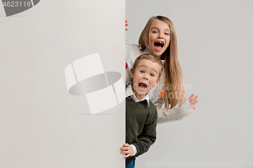 Image of Banner with a surprised children peeking at the edge