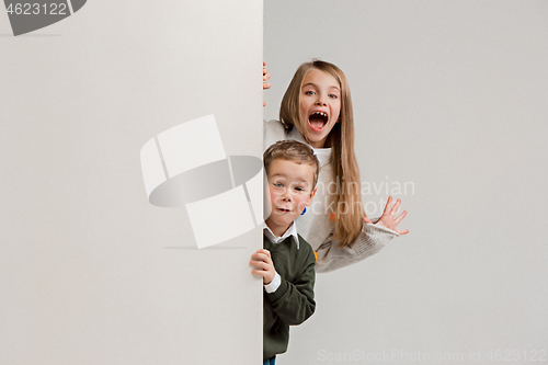 Image of Banner with a surprised children peeking at the edge