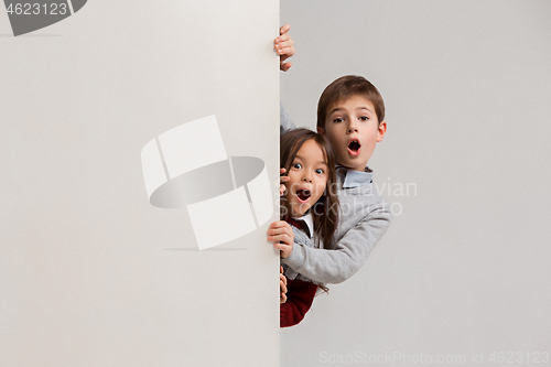 Image of Banner with a surprised children peeking at the edge