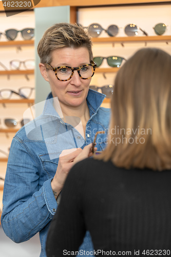 Image of woman in a eyewear store