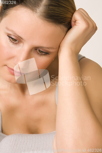 Image of young beautiful sad woman