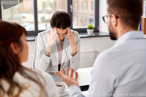 Image of recruiters having job interview with employee