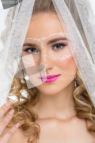 Image of Bride with mask drawn on face