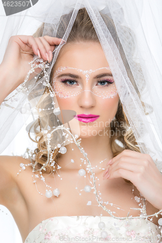 Image of Bride with mask drawn on face