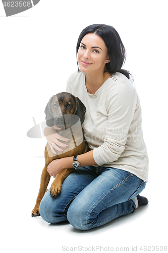 Image of Beautiful girl with dog