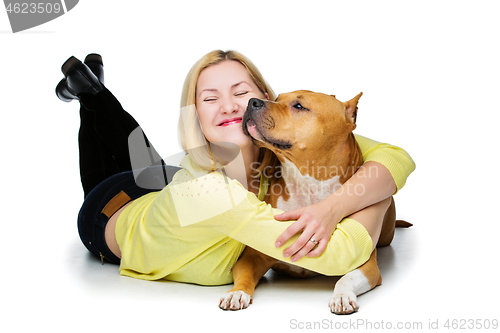 Image of Girl with amstaff dog