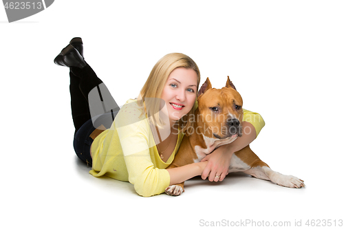 Image of Girl with amstaff dog