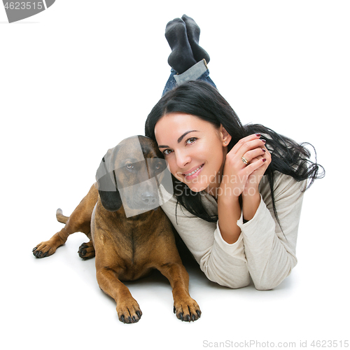 Image of Beautiful girl with dog