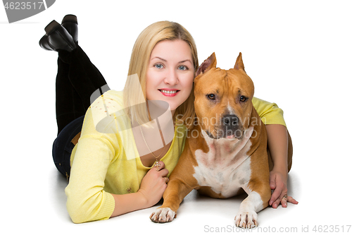 Image of Girl with amstaff dog