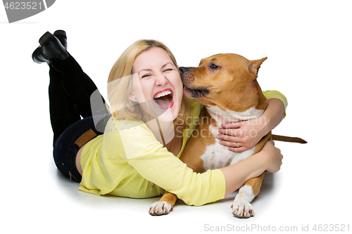 Image of Girl with amstaff dog