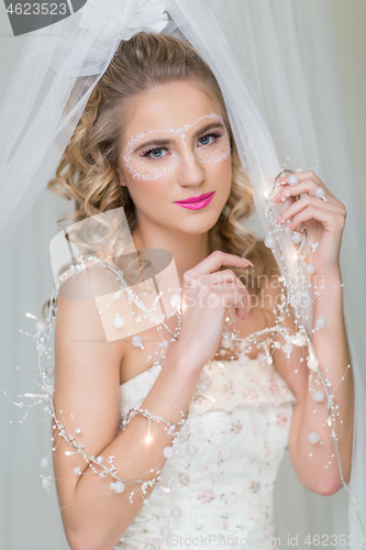 Image of Bride with mask drawn on face