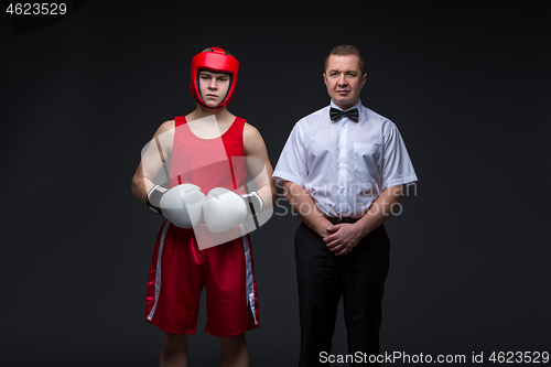 Image of Referee and boxing sportsman 