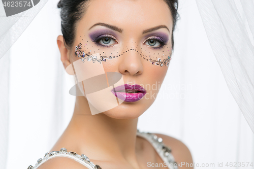 Image of Bride with mask drawn on face