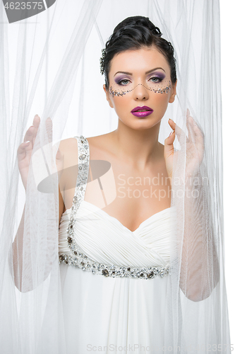 Image of Bride with mask drawn on face