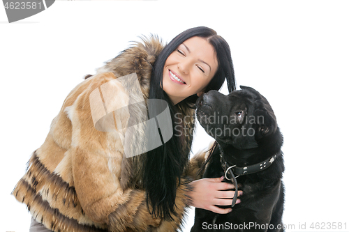 Image of Girl with black shar pei dog