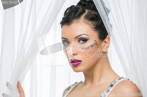 Image of Bride with mask drawn on face