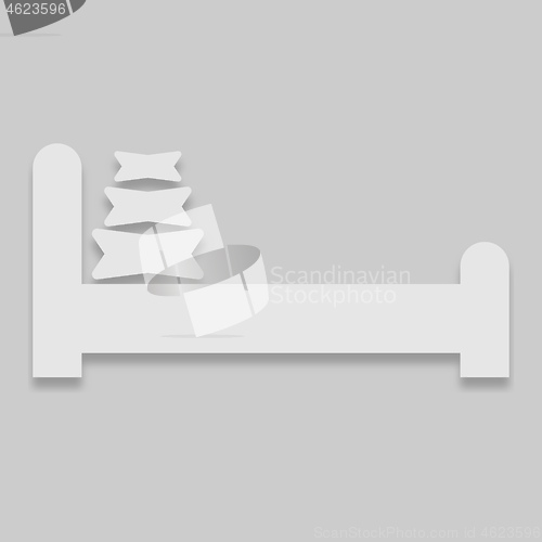 Image of bed with three pillows