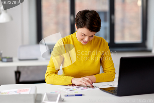 Image of ui designer working on user interface at office