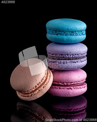 Image of Colorful macaroon each other and one next