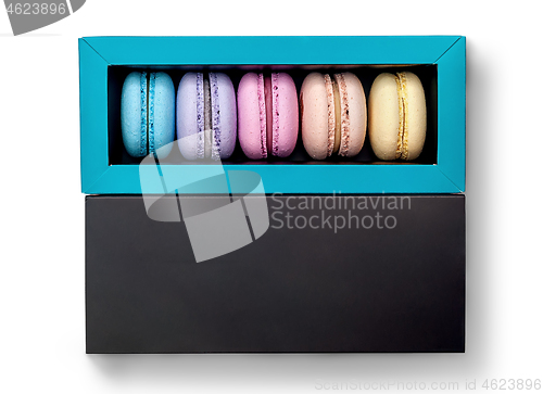 Image of French macaroon in box top view