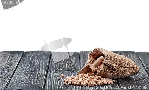 Image of Chickpea spill out of bag and scoop