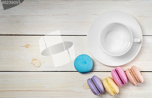 Image of Macaroons and empty cup top view