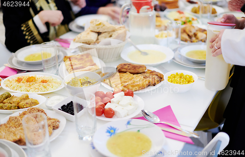 Image of muslim family having a Ramadan feast