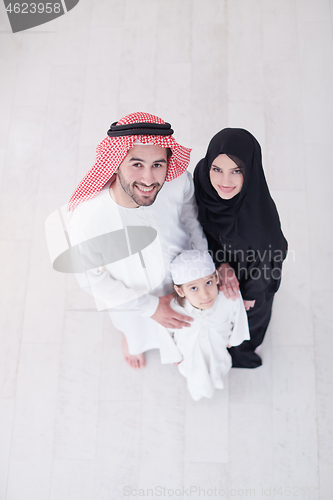 Image of portrait of young happy arabian muslim family top view