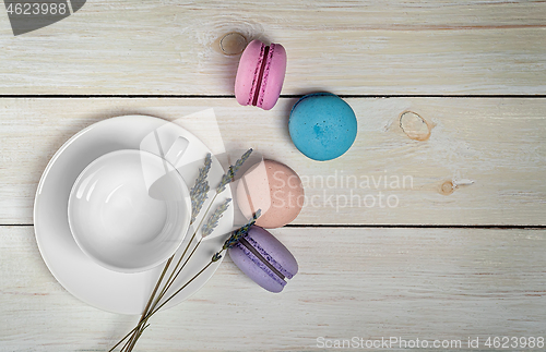 Image of Macaroons next to coffee cup top view