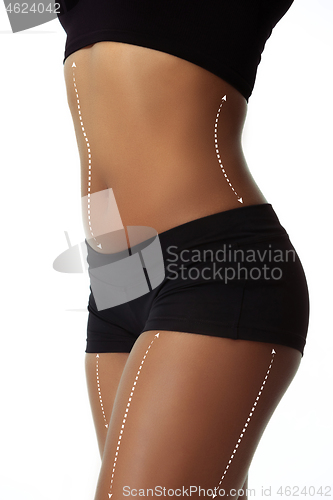 Image of Beautiful female legs and belly on white background. Beauty, cosmetics, spa, bodycare and lifting, correction surgery, fitness concept