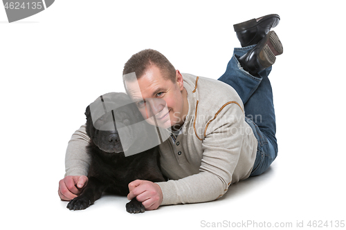 Image of Man with shar pei dog