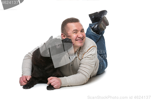 Image of Man with shar pei dog