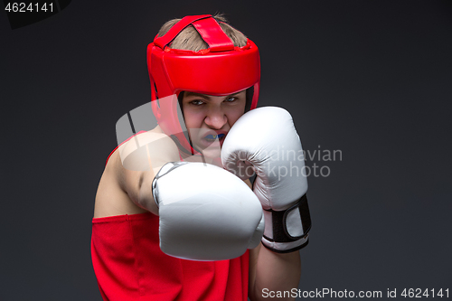 Image of Young boxer in red form