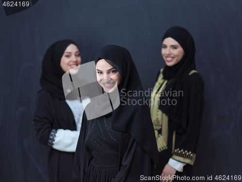 Image of portrait of beautiful muslim women in fashionable dress