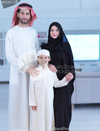 Image of portrait of young happy arabian muslim family