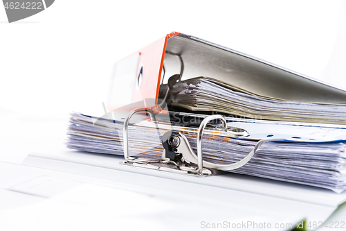 Image of Folders filled with documents on white background