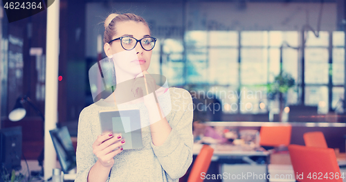 Image of Businesswoman using tablet