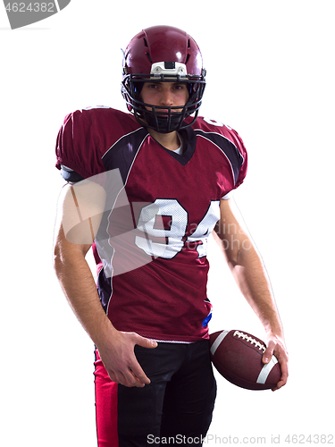 Image of Portrait of American football player pointing against white back