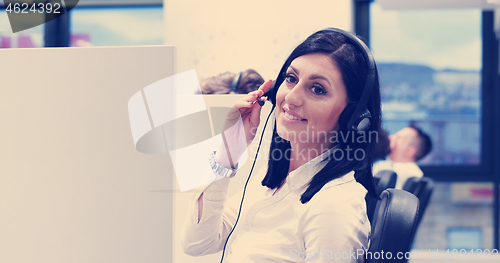 Image of female call centre operator doing her job