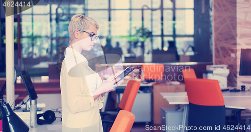 Image of Businesswoman using tablet