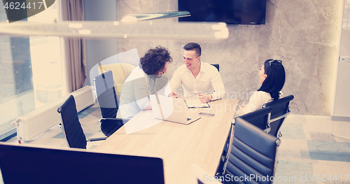 Image of Startup Business Team At A Meeting at modern office building