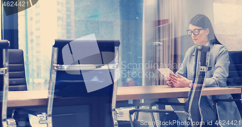 Image of Businesswoman using tablet