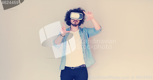Image of Man using headset of virtual reality