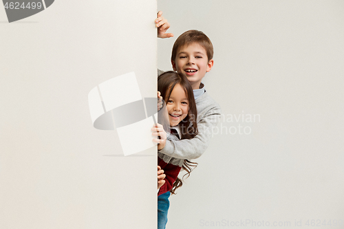 Image of Banner with a surprised children peeking at the edge