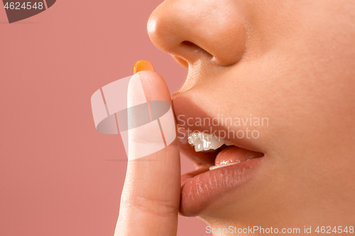 Image of Beautiful young woman with teeth braces